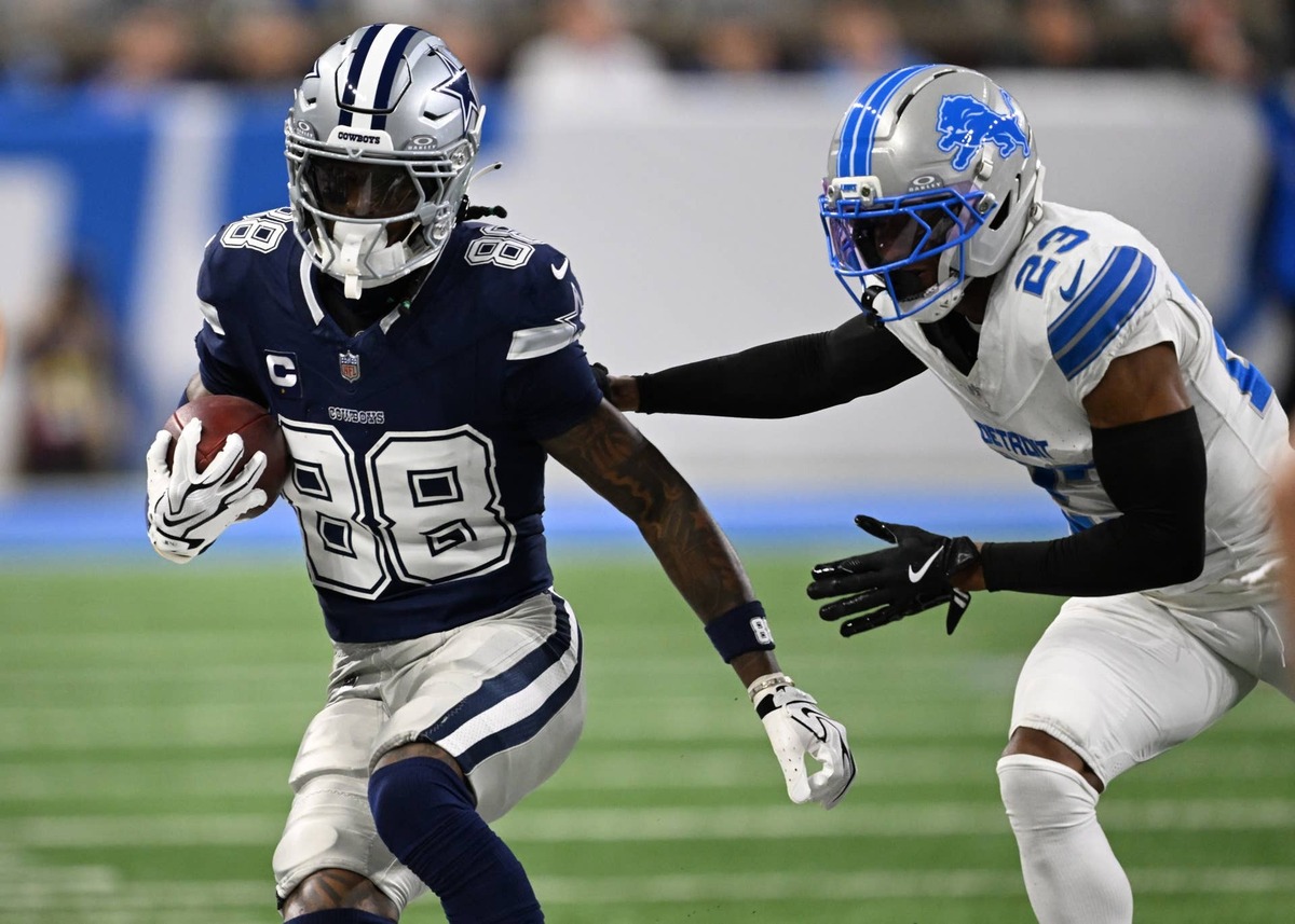  Dec 4, 2025; Detroit, Michigan, USA; Dallas Cowboys wide receiver CeeDee Lamb (88) runs against Detroit Lions cornerback Rock Ya-Sin (23) during the first half at Ford Field. Mandatory Credit: Lon Horwedel-Imagn Images 
