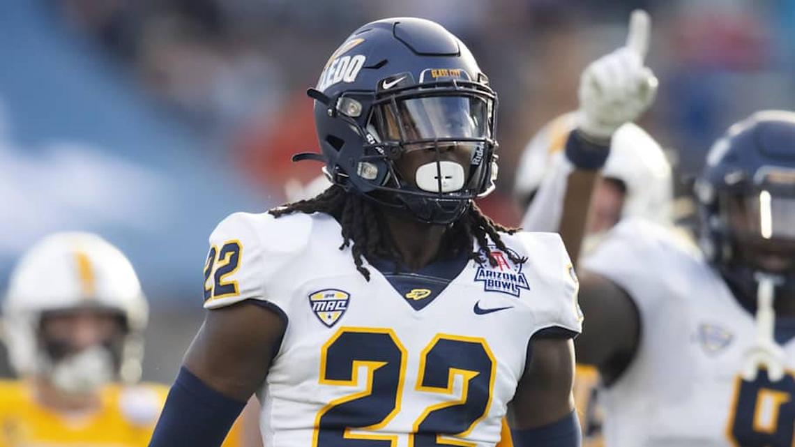 Dec 30, 2023; Tucson, AZ, USA; Toledo Rockets safety Emmanuel McNeil-Warren (22) against the Wyoming Cowboys in the Arizona Bowl at Arizona Stadium. Mandatory Credit: Mark J. Rebilas-USA TODAY Sports. 