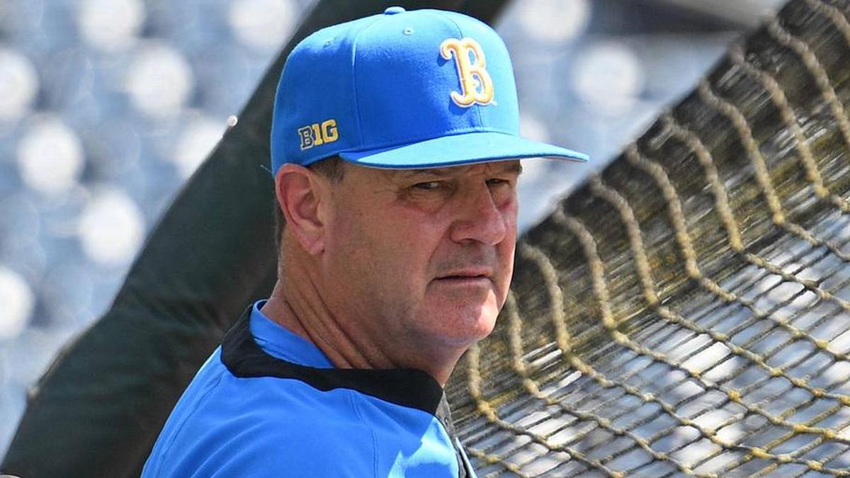  Jun 14, 2025; Omaha, Neb, USA; UCLA Bruins head coach John Savage watches the team warm up before the game against the Murray State Races at Charles Schwab Field. Mandatory Credit: Steven Branscombe-Imagn Images | Steven Branscombe-Imagn Images 