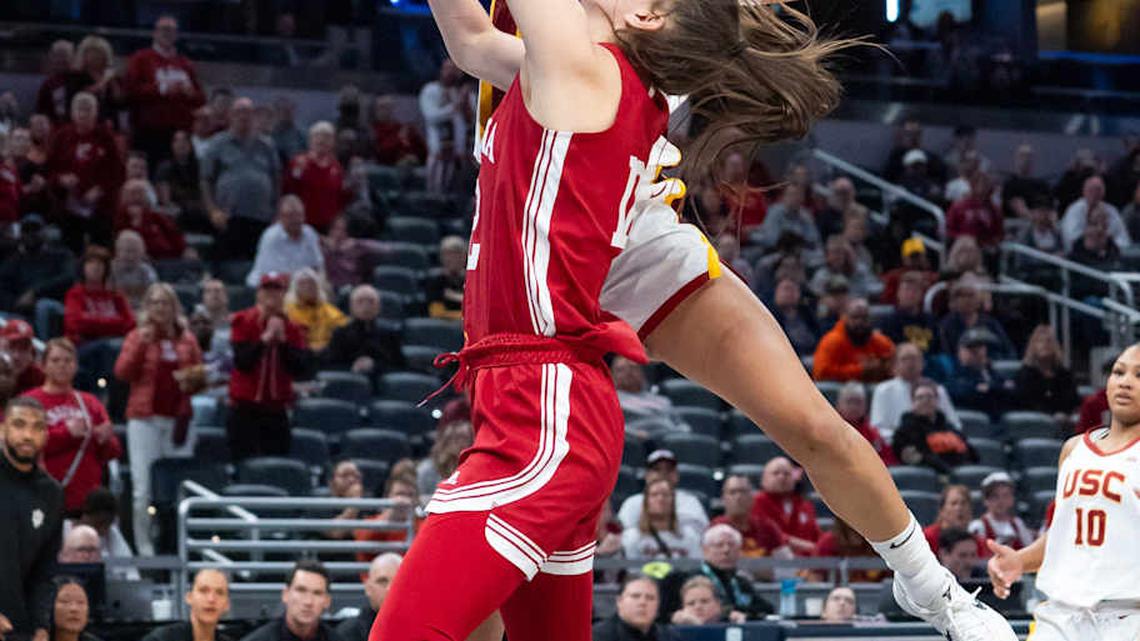  Indiana Hoosiers guard Yarden Garzon (12) is blocked Friday, March 7, 2025, by USC Trojans guard JuJu Watkins (12) during the Big Ten women's tournament at Gainbridge Fieldhouse in Indianapolis. | Mykal McEldowney/IndyStar / USA TODAY NETWORK via Imagn Images 