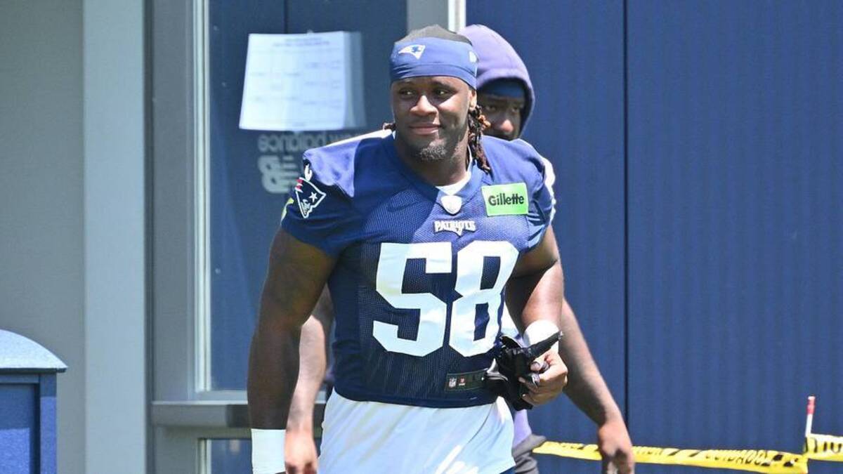  Jun 10, 2026; Foxborough, MA, USA; New England Patriots linebacker Xavier Holmes (58) arrives at the practice field for minicamp at Gillette Stadium. Mandatory Credit: Eric Canha-Imagn Images | Eric Canha-Imagn Images 