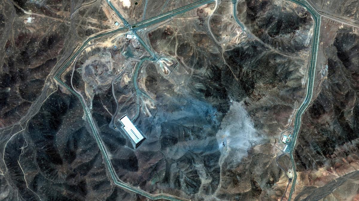 In a satellite image provided by Maxar Technologies, damage at the Fordo enrichment facility in Iran after the U.S. strikes, June 22, 2025. When Israel began its assault on Iran, President Donald Trump kept his distance -- but within days he was on a path that led to an extensive bombing mission aided by political and military ruses. (Maxar Technologies via The New York Times) -- NO SALES, FOR EDITORIAL USE ONLY WITH NYT STORY TRUMP IRAN RECONSTRUCT BY MAZZETTI, SWAN, HABERMAN, SCHMITT AND COOPER FOR JUNE 22, 2025. ALL OTHER USE PROHIBITED, MAXAR WATERMARK MUST NOT BE CROPPED OUT. --