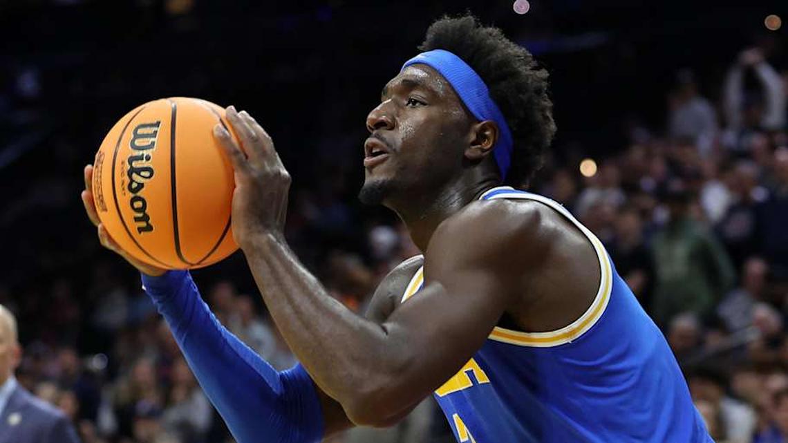  Mar 22, 2026; Philadelphia, PA, USA; UCLA Bruins forward Eric Dailey Jr. (3) shoots the ball against the UConn Huskies in the second half during a second round game of the men's 2026 NCAA Tournament at Xfinity Mobile Arena. Mandatory Credit: Bill Streicher-Imagn Images | Bill Streicher-Imagn Images 