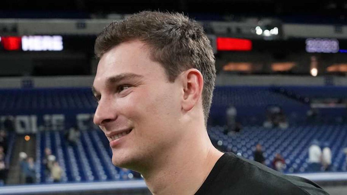  Feb 28, 2026; Indianapolis, IN, USA; Indiana quarterback Fernando Mendoza (QB11) looks on during the NFL Scouting Combine at Lucas Oil Stadium. Mandatory Credit: Kirby Lee-Imagn Images | Kirby Lee-Imagn Images 