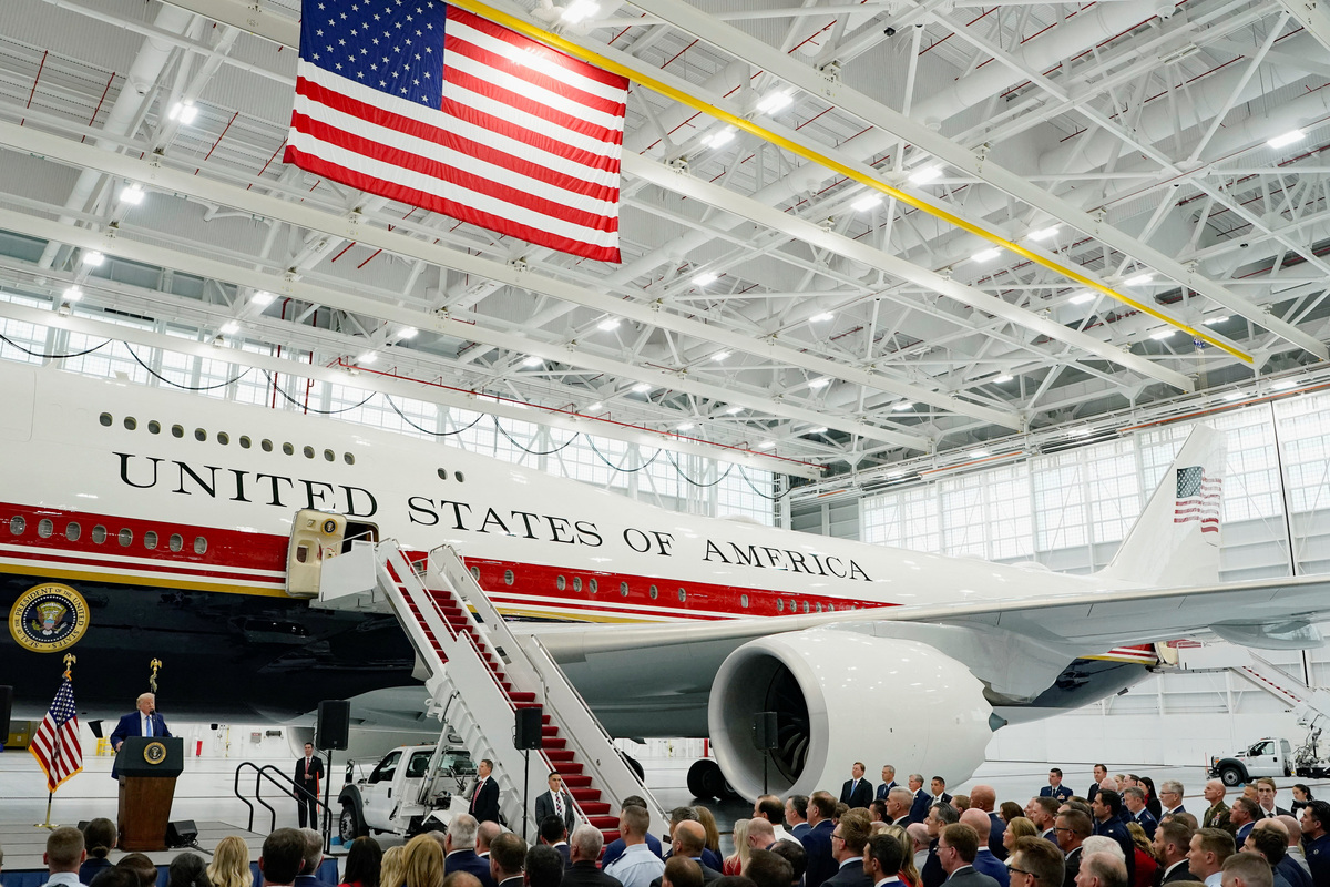 U.S. President Donald Trump delivers a speech as he stands in front of the VC-25B aircraft gifted by Qatar that will be used as Air Force One, at Joint Base Andrews, Maryland, U.S., June 19, 2026. REUTERS/Elizabeth Frantz