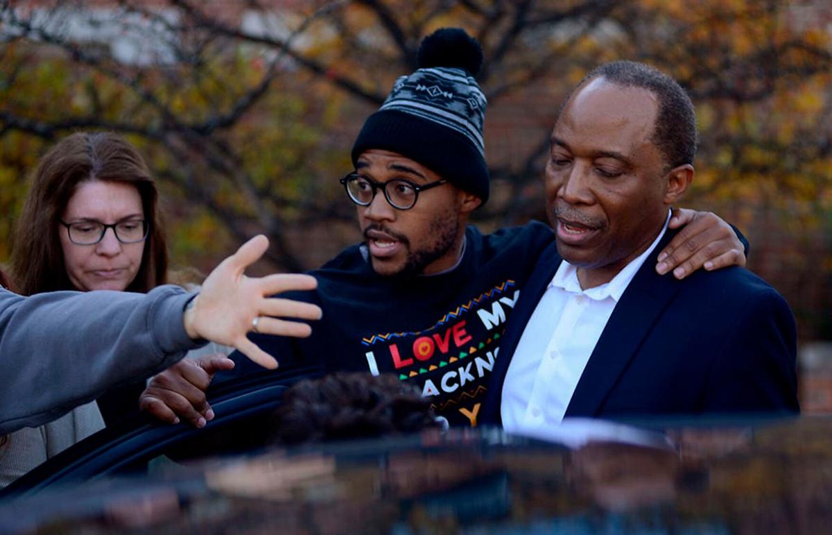 Jonathan Butler enters a car as he leaves campus after UM System President Tim Wolfe officially resigned on Nov. 9, 2015.