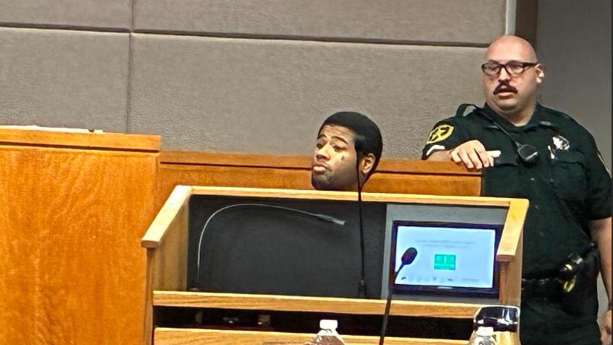 Davinci Cheesman Dawson takes the stand for the defense in the Dexavion J'Neil Brown murder trial on July 8.