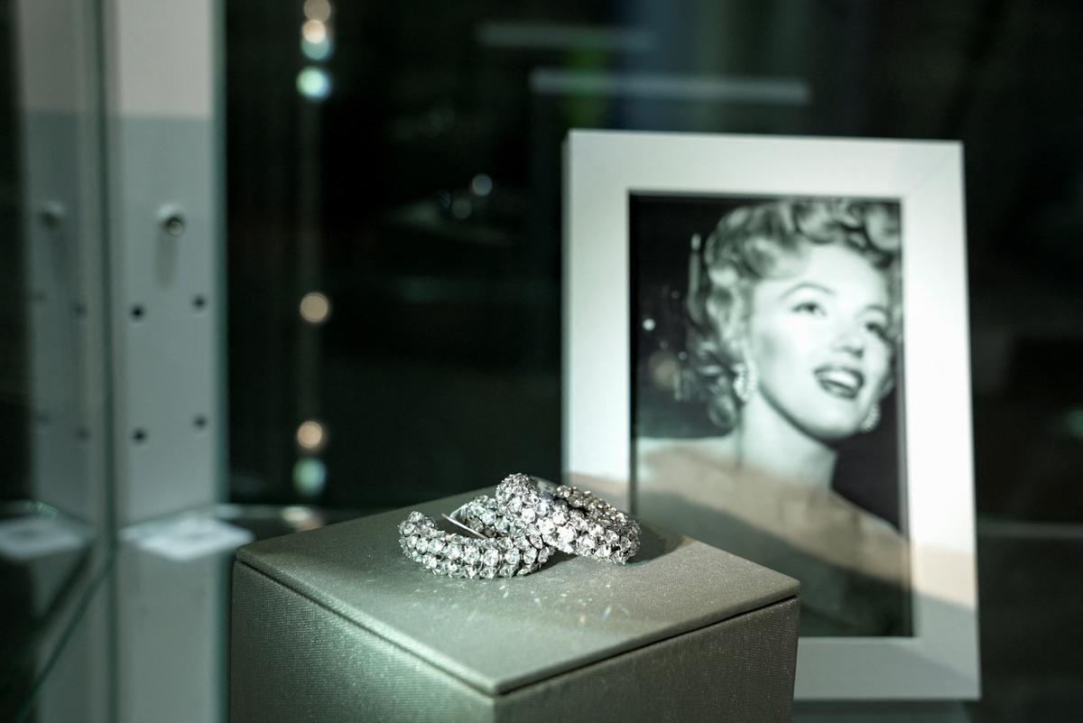 Memorabilia belonging to late model and movie star Marilyn Monroe is displayed alongside a photograph during a preview ahead of an upcoming auction in Los Angeles, California, U.S., May 8, 2026. REUTERS/Arafat Barbakh