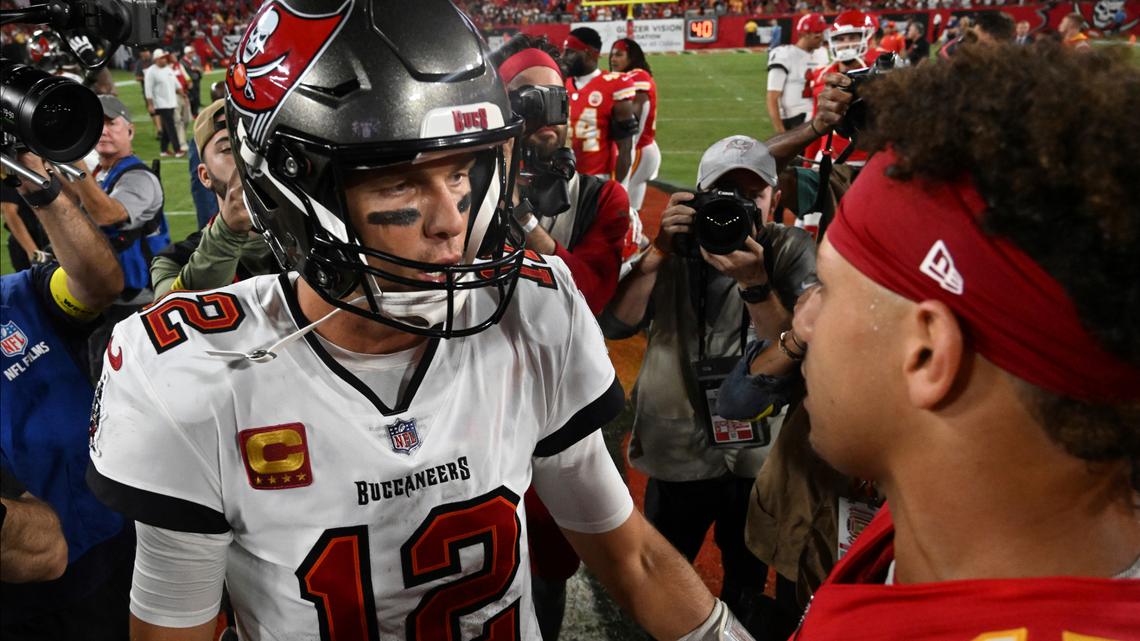 Tampa Bay Buccaneers quarterback Tom Brady (12) and Kansas City Chiefs quarterback Patrick Mahomes (15) greet each other after an NFL football game Sunday, Oct. 2, 2022, in Tampa, Fla. The Chiefs won 41-31. (AP Photo/Jason Behnken)