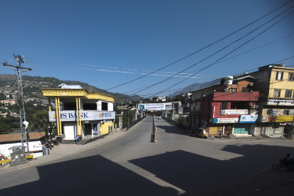 A deserted view of a street during a shutter-down strike called by the banned Joint Awami Action Committee (JAAC), an alliance of civil society groups, in Muzaffarabad, Pakistani Kashmir, June 9, 2026. Picture taken with a mobile phone. REUTERS/Stringer