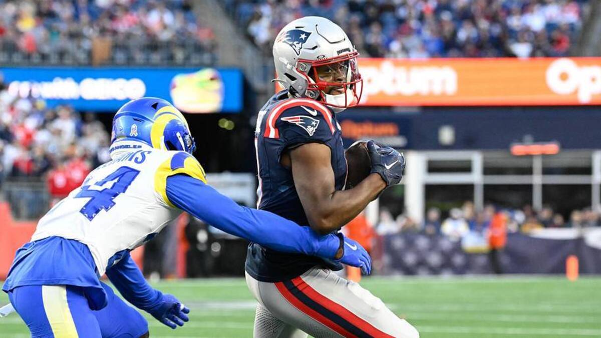  Nov 17, 2024; Foxborough, Massachusetts, USA; New England Patriots wide receiver Kayshon Boutte (9) tries to break a tackle by Los Angeles Rams cornerback Darious Williams (24) during the second half at Gillette Stadium. Mandatory Credit: Eric Canha-Imagn Images | Eric Canha-Imagn Images 