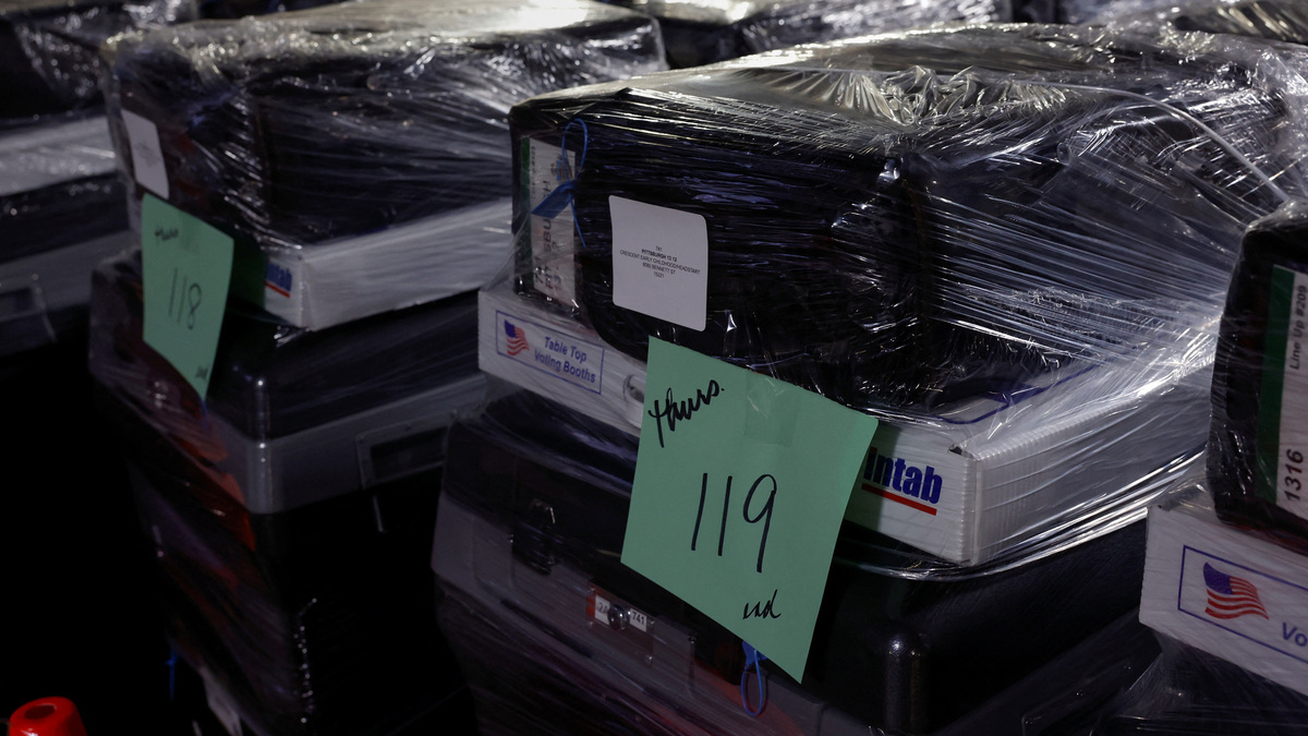 FILE PHOTO: Wrapped voting machines wait for delivery inside the Allegheny County Elections Warehouse in Pittsburgh, Pennsylvania, U.S., October 30, 2024. REUTERS/Shannon Stapleton/File Photo