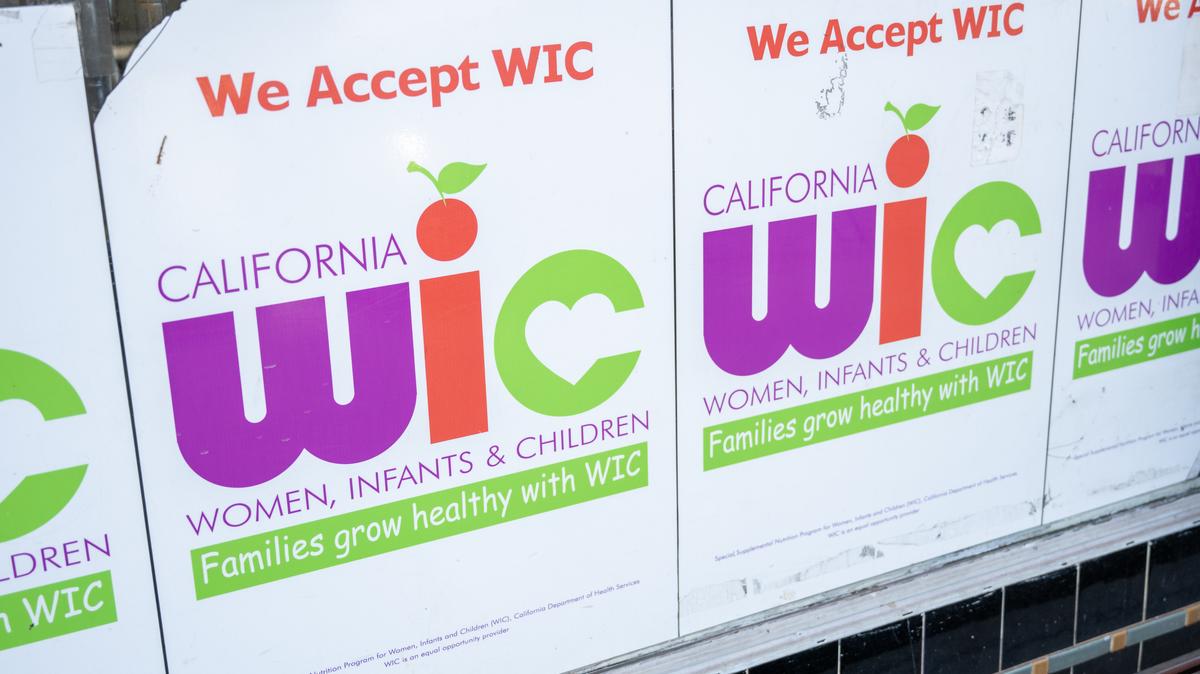 Close-up of California WIC program window signs reading We Accept WIC at a neighborhood business, San Francisco, California, May 20, 2026. (Photo by Smith Collection/Gado/Getty Images). 