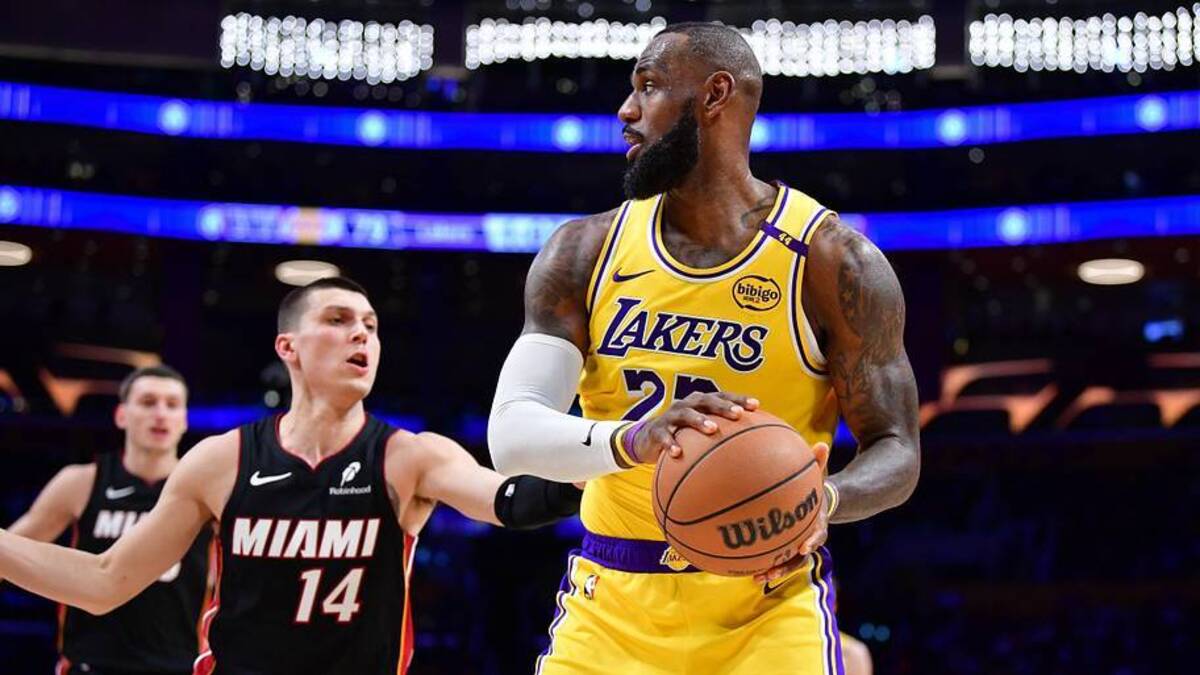  January 15, 2025; Los Angeles, California, USA; Los Angeles Lakers forward LeBron James (23) moves the ball against Miami Heat guard Tyler Herro (14) during the second half at Crypto.com Arena. Mandatory Credit: Gary A. Vasquez-Imagn Images | USA TODAY Sports via Reuters Connect 