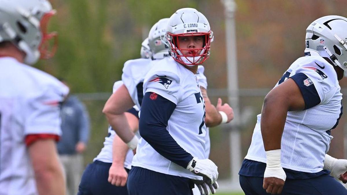  May 9, 2026; Foxborough, MA, USA; New England Patriots tackle Caleb Lomu (74) warms up during the New England Patriots rookie camp at Gillette Stadium. Mandatory Credit: Eric Canha-Imagn Images | Eric Canha-Imagn Images 