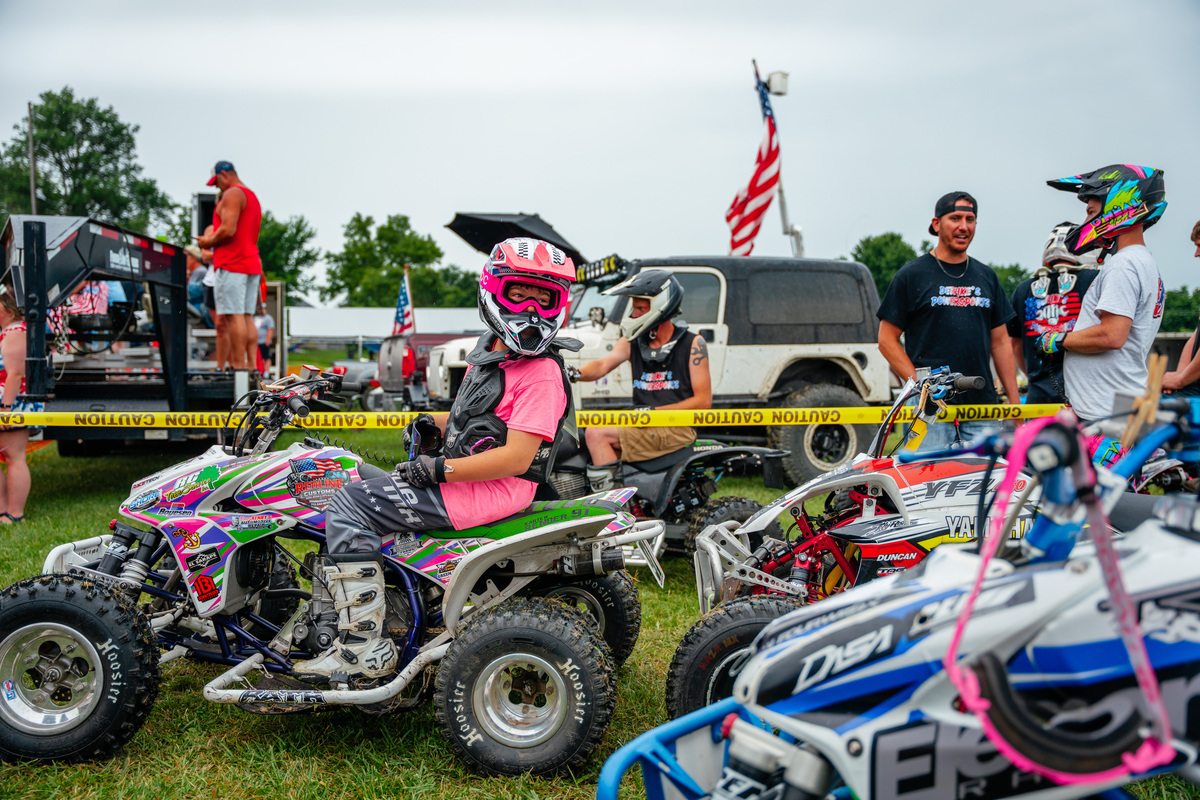 Spectators watch ATV races in the small town of New Market, Iowa, during events celebrating the 250th anniversary of the United States in Washington, July 4, 2026. America celebrates the 250th anniversary of its independence today, with people from one end of the country to the other marking the milestone with fireworks, parades and concerts. (Jamie Kelter Davis/The New York Times)