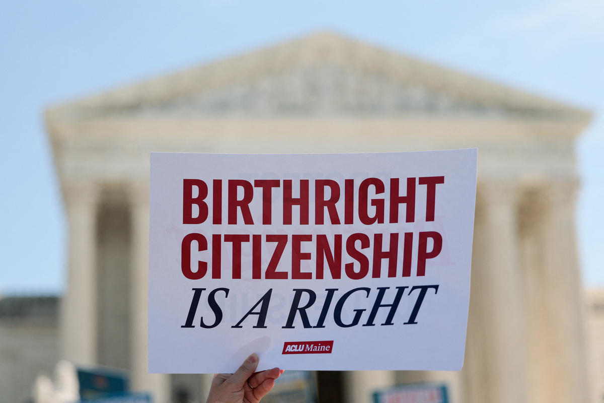  Demonstrators rally in support of birthright citizenship outside the US Supreme Court in Washington, DC on April 1, 2026. President Donald Trump attended in person as the US Supreme Court heard a landmark case weighing the constitutionality of his contentious bid to end birthright citizenship, an extraordinary and possibly unprecedented move for the nation’s highest office. (Photo by Mandel NGAN / AFP via Getty Images) 