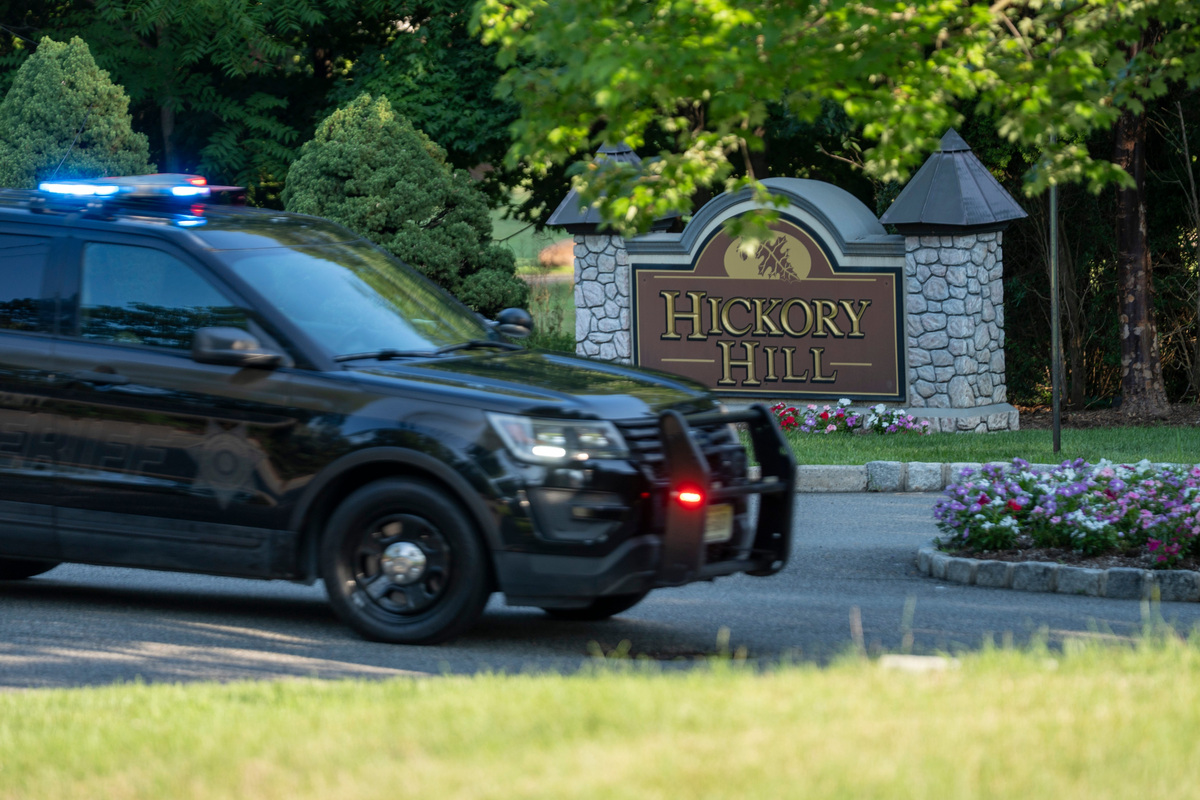 A Passaic County Sheriff's vehicle responded to a scene during an investigation at Hickory Hill, a private gated community, on Monday, July 13, 2026, in Totowa, New Jersey.