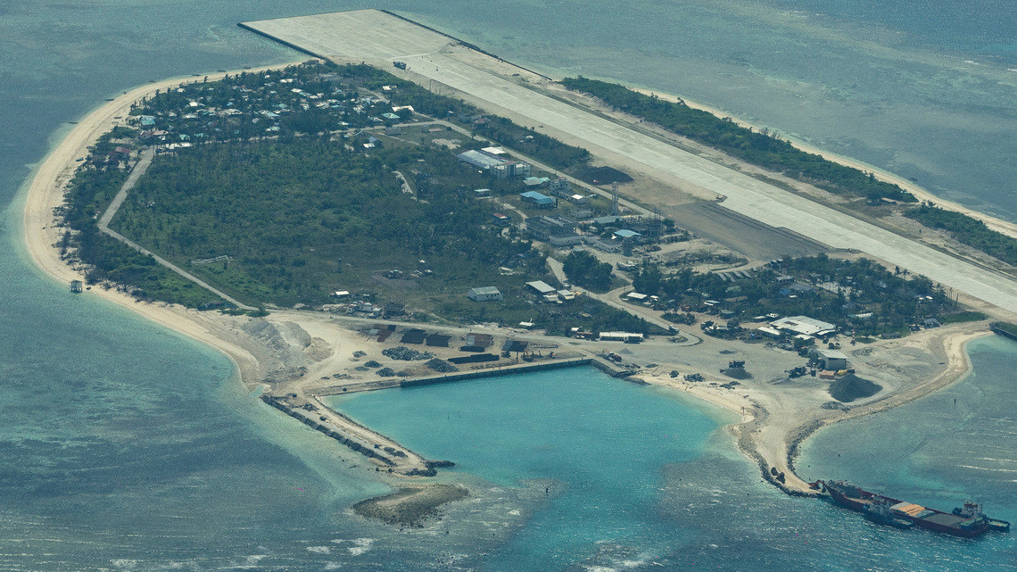 China sends naval forces to monitor US warship near disputed shoal 