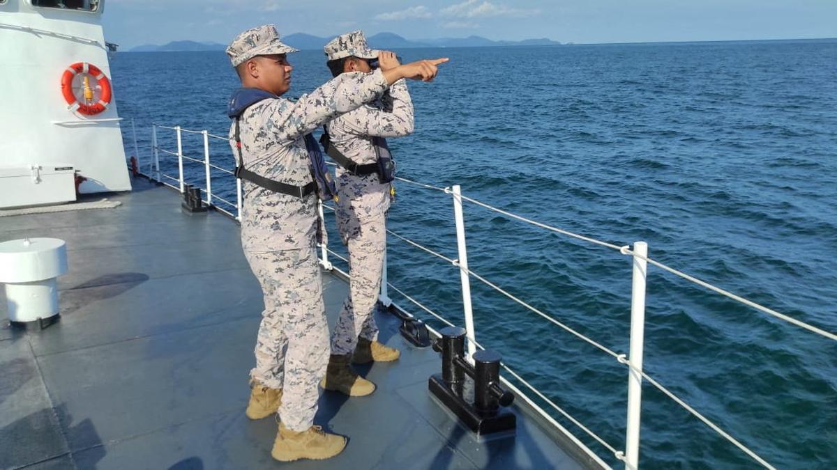 Malaysia's maritime agency officers search for victims during a search and rescue operation after 14 people went missing as a boat believed to be carrying undocumented Indonesian migrants sank off the coast of Pangkor Island, Malaysia in this undated handout released May 12, 2026. Malaysian Maritime Enforcement Agency/Handout via Reuters