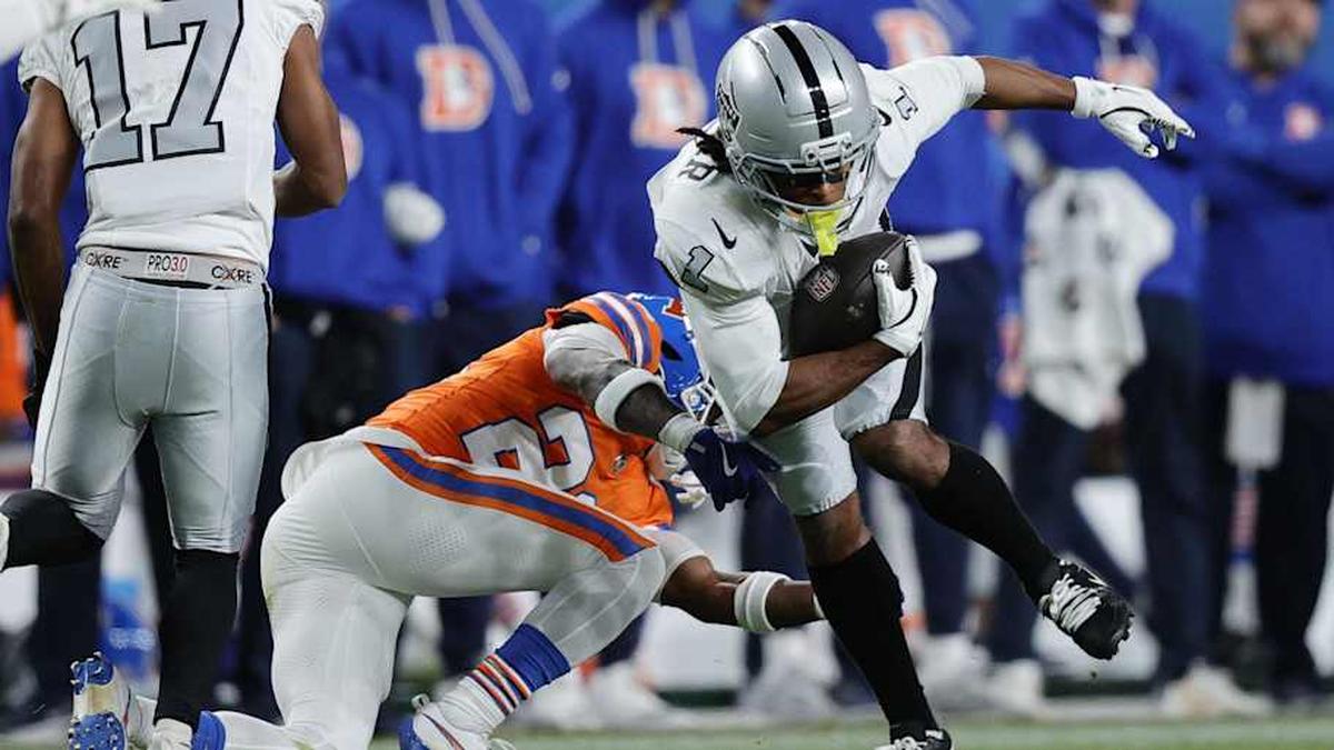  Nov 6, 2025; Denver, Colorado, USA; Las Vegas Raiders wide receiver Tre Tucker (1) makes a catch against the Denver Broncos during the second half at Empower Field at Mile High. Mandatory Credit: Isaiah J. Downing-Imagn Images | Isaiah J. Downing-Imagn Images 