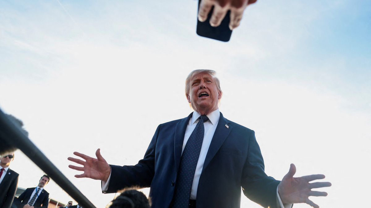U.S. President Donald Trump speaks to the media upon arrival at Paris Orly airport, following the G7 Summit, in Orly, France, June 17, 2026. REUTERS/Evelyn Hockstein