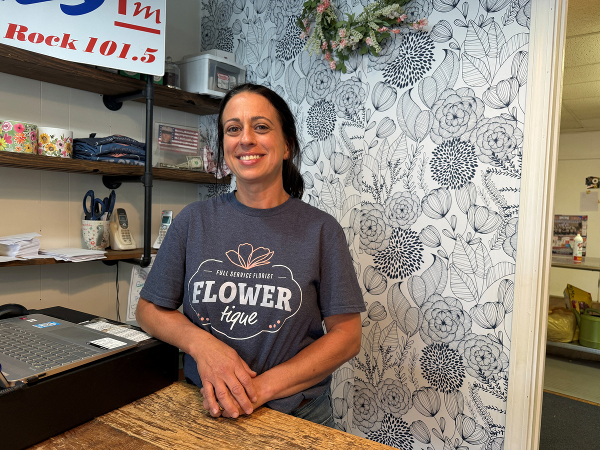 Amy Tubbs, a florist who plans to vote for Republican U.S. Representative Ashley Hinson for Iowa's open Senate seat, poses for a photograph in her flower shop in Centerville, Iowa, U.S., June 22, 2026. Picture taken with a mobile phone. REUTERS/Nathan Layne