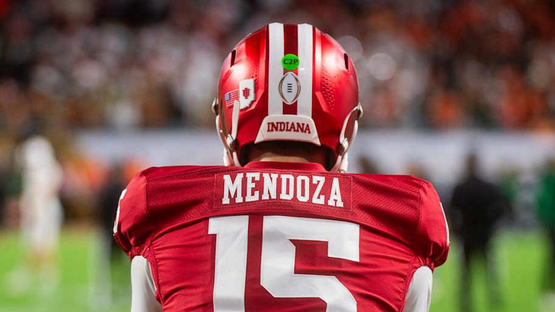  Indiana's Fernando Mendoza (15) gets loose before the College Football Playoff National Championship college football game at Hard Rock Stadium in Miami Gardens on Monday, Jan. 19, 2026. | Rich Janzaruk/Herald-Times / USA TODAY NETWORK via Imagn Images 