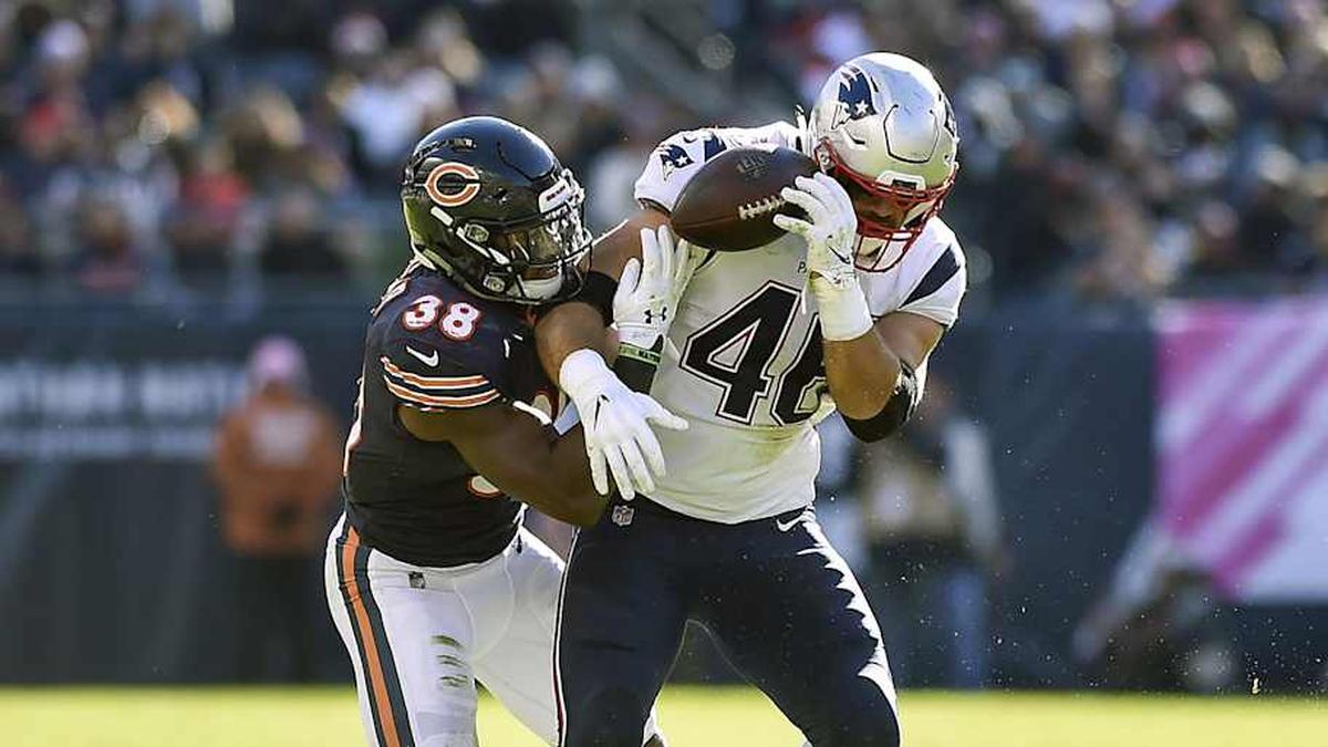  Oct 21, 2018; Chicago, IL, USA; Chicago Bears strong safety Adrian Amos (38) deflects the ball away from New England Patriots fullback James Develin at Soldier Field. Mandatory Credit: Quinn Harris-Imagn Images | Quinn Harris-Imagn Images 