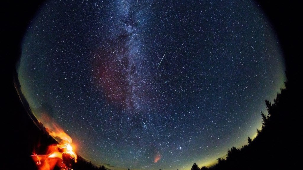 A meteor streaks across the sky during the annual Perseid meteor shower on Friday, Aug. 12, 2016 in Spruce Knob, West Virginia.
