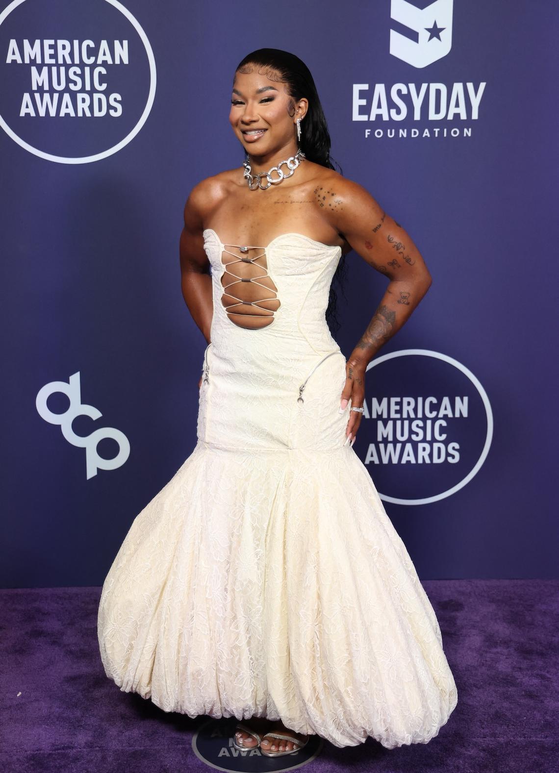 Jordan Chiles – Worst Jordan Chiles took a risk by wearing a white gown with a revealing plunging neckline. Michael Tran / AFP