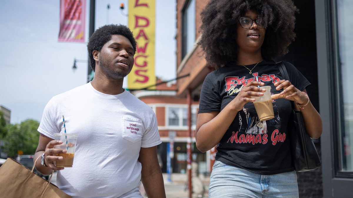 D’Jhanir Harris Smith, 22, of Chicago’s Hyde Park neighborhood, walks with his partner Kamryn McPhaul, 22, of Chicago’s Rogers Park neighborhood, along N. Clark St.  in Chicago’s Andersonville neighborhood on Sunday, May, 31, 2026. “We are in Chicago where it’s such a fun city to be young in, explore things and where so much social infrastructure is built.” McPhaul said. “McPhaul has been limiting herself to an hour a day of phone usage since February and is spending more time exploring on solo trips or with friends. (Josh Boland/Chicago Tribune/TNS)