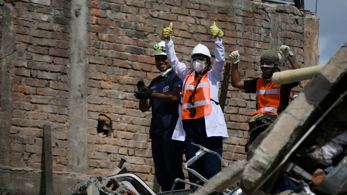 Hundreds still missing in Colombia as desperation grips earthquake rescue effort 