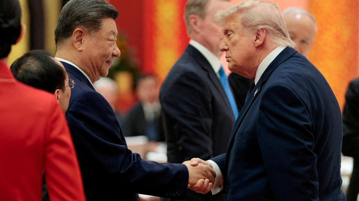 Chinese President Xi Jinping and U.S. President Donald Trump shake hands at a state banquet at the Great Hall of the People in Beijing, China, May 14, 2026. REUTERS/Evan Vucci
