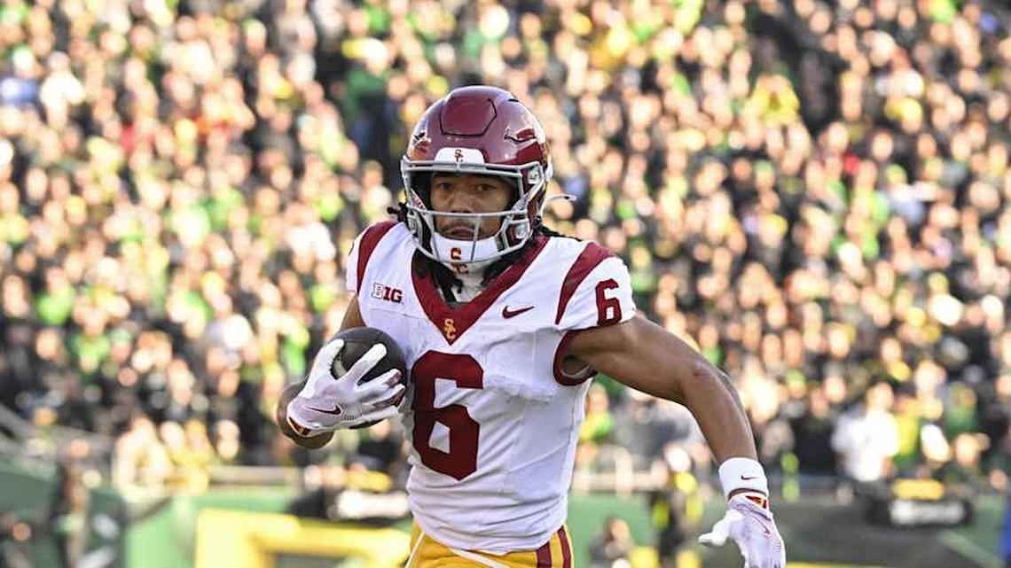  Nov 22, 2025; Eugene, Oregon, USA; Southern California Trojans wide receiver Makai Lemon (6) runs with the ball during the first half against the Oregon Ducks at Autzen Stadium. Mandatory Credit: Troy Wayrynen-Imagn Images | Troy Wayrynen-Imagn Images 