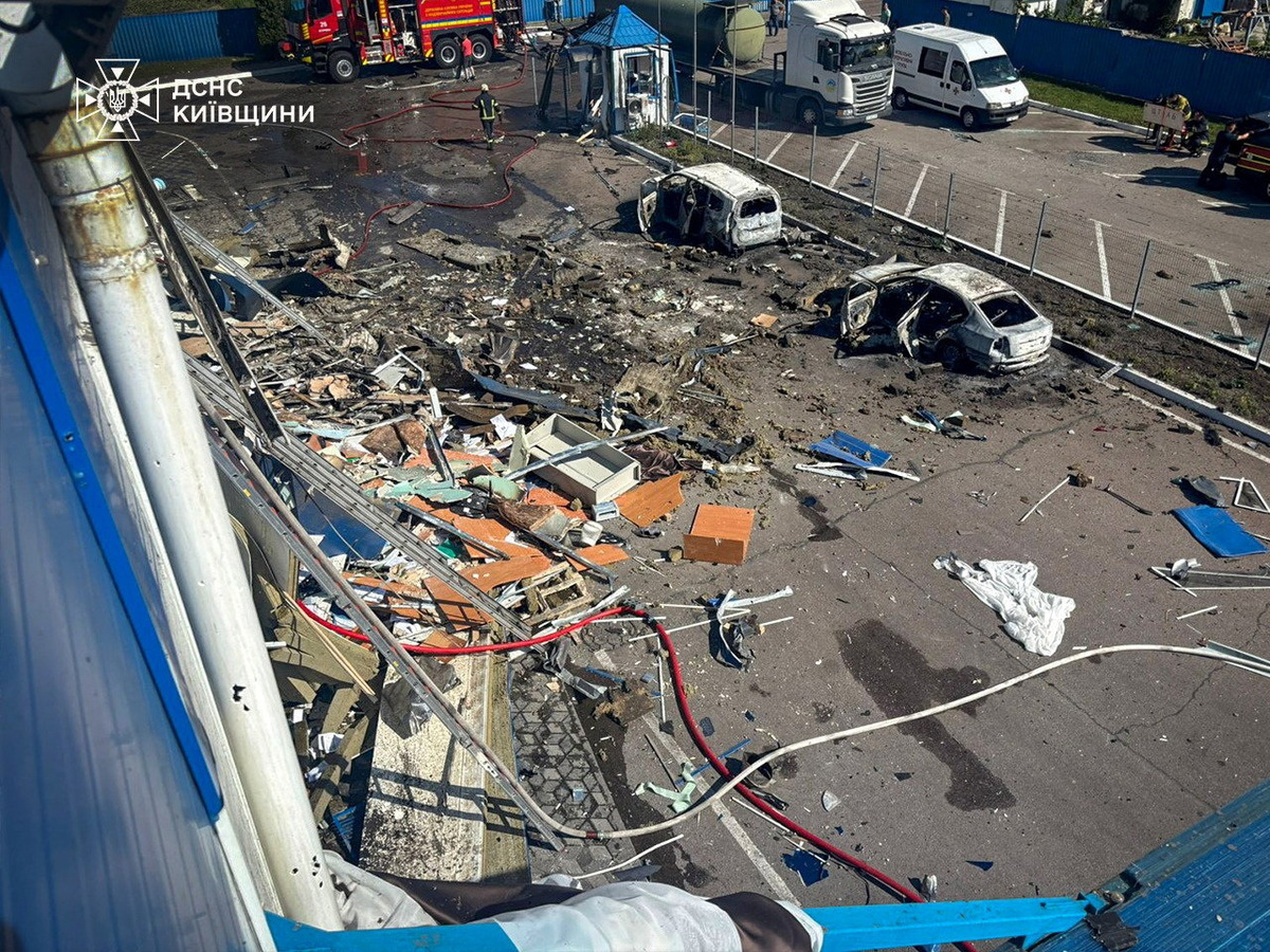 Rescuers work at a site of a dairy plant hit by a Russian drone strike, amid Russia's attack on Ukraine, in Kyiv region, Ukraine in this handout picture released June 5, 2026. Press service of the State Emergency Service of Ukraine in Kyiv region/Handout via REUTERS