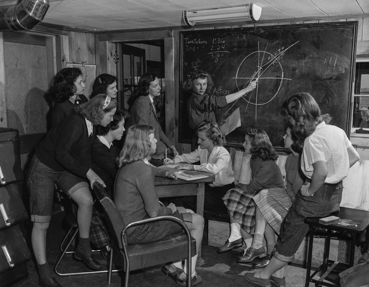  The women of Smith College's flying club learn about airplane maintenance, flying instruction and flight logging management in September 1945. George Woodruff/Bettmann Archive/Getty Images 