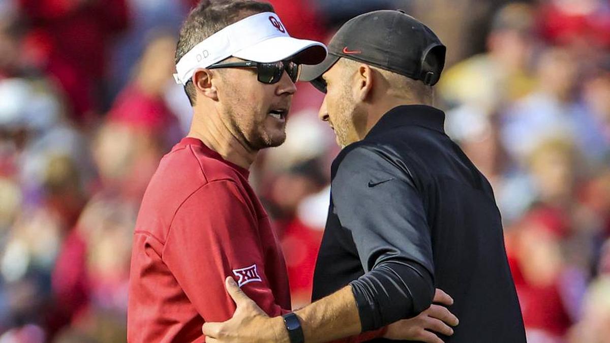  Nov 20, 2021; Norman, Oklahoma, USA; Oklahoma Sooners head coach Lincoln Riley (left) speaks with Iowa State Cyclones head coach Matt Campbell (right) after the game at Gaylord Family-Oklahoma Memorial Stadium. Mandatory Credit: Kevin Jairaj-Imagn Images | Kevin Jairaj-Imagn Images 