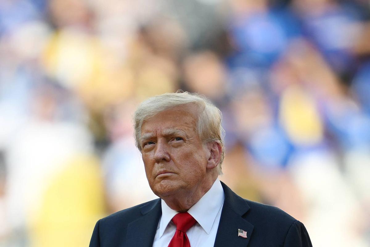  US President Donald Trump looks on during the award ceremony for the FIFA Club World Cup 2025 Champions, following the final football match between England's Chelsea and France's Paris Saint-Germain at the MetLife Stadium in East Rutherford, New Jersey on July 13, 2025. (Photo by ANGELA WEISS / AFP) (Photo by ANGELA WEISS/AFP via Getty Images) 