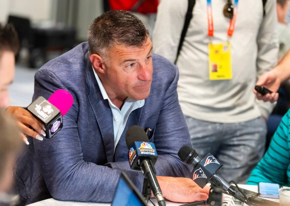  New England Patriots head coach Mike Vrabel speaks to reporters in the media during the 2026 NFL Annual League Meeting. Mark J. Rebilas-Imagn Images