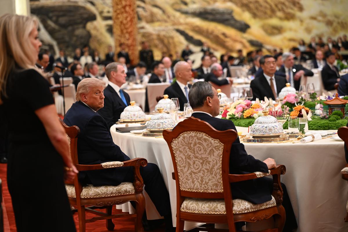 President Donald Trump takes part in a state banquet at the Great Hall of the People in Beijing during a two-day summit with President Xi Jinping of China, on Thursday, May 14, 2026. During the first U.S. presidential visit to China in nearly a decade, Xi delivered a warning on Taiwan, saying that the issue, if handled poorly, could lead to conflict and "an extremely dangerous situation." (Kenny Holston/The New York Times)..