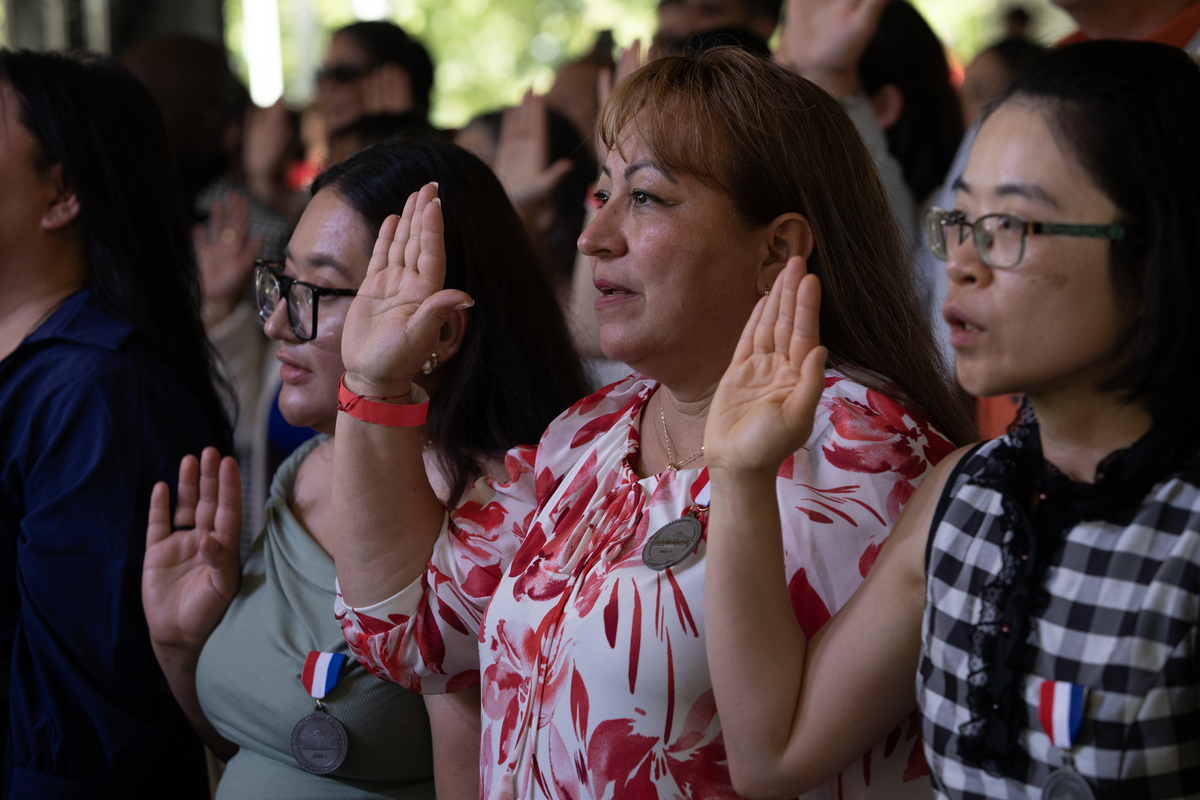 New citizens take the oath at a naturalization ceremony at Monticello in Charlottesville, Va., on July 4. 2026. America celebrates the 250th anniversary of its independence today, with people from one end of the country to the other marking the milestone with fireworks, parades and concerts. (Kirsten Luce/The New York Times)