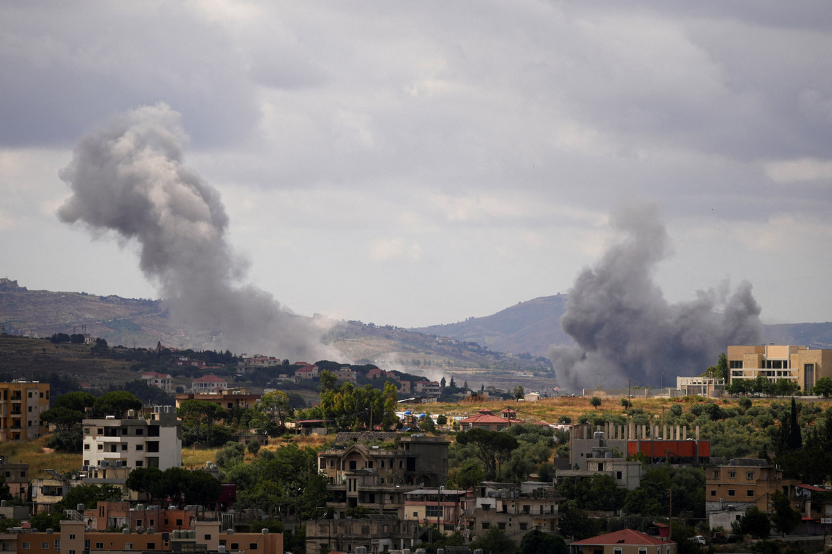 Smoke billows from southern Lebanon, following Israeli strikes, as seen from Nabatieh, Lebanon, June 14, 2026. REUTERS/Stringer