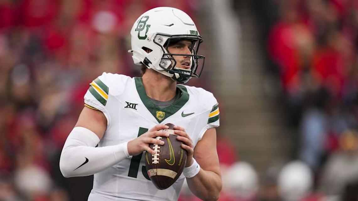  Oct 25, 2025; Cincinnati, Ohio, USA; Baylor Bears quarterback Sawyer Robertson (13) drops back to pass against the Cincinnati Bearcats in the first half at Nippert Stadium. Mandatory Credit: Aaron Doster-Imagn Images | Aaron Doster-Imagn Images 