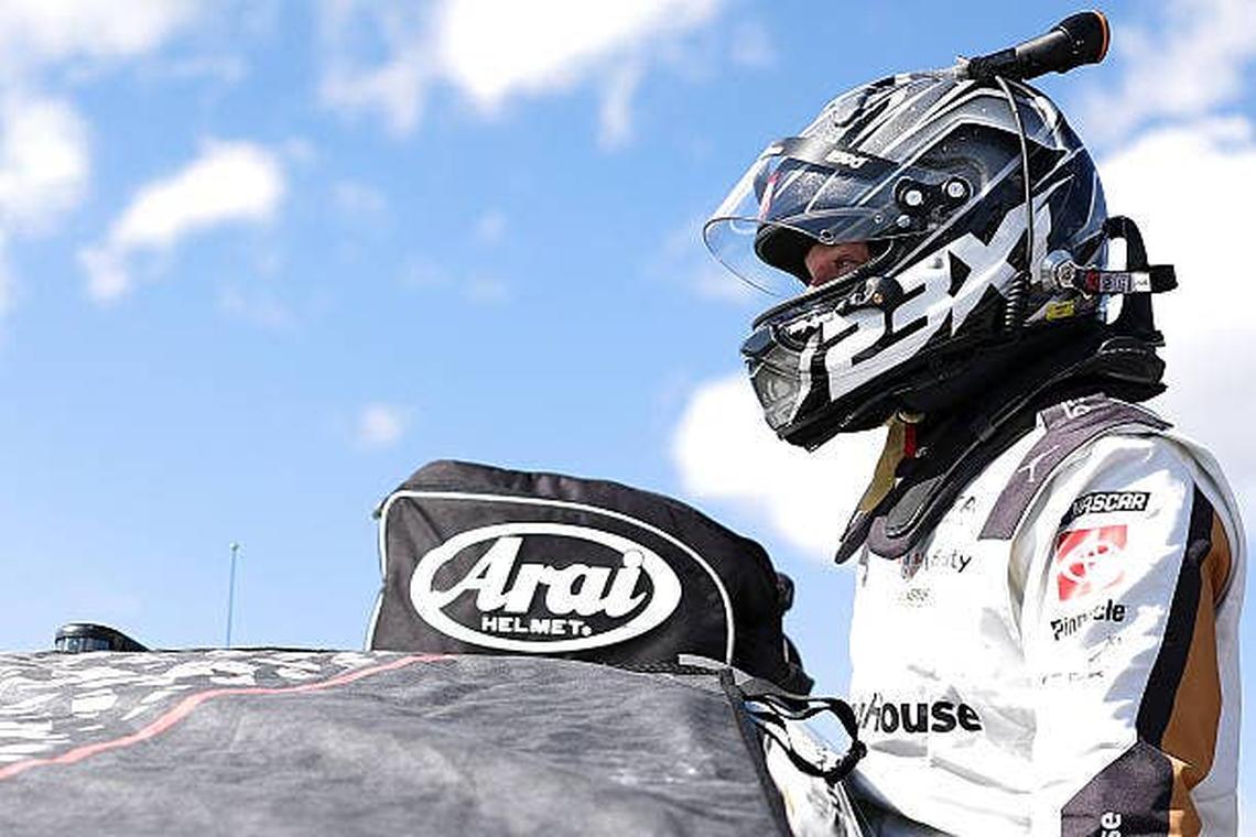  Tyler Reddick enters his car during qualifying for the NASCAR Cup Series AdventHealth 400 at Kansas Speedway. (Photo by David Jensen/Getty Images) Photo by David Jensen/Getty Images