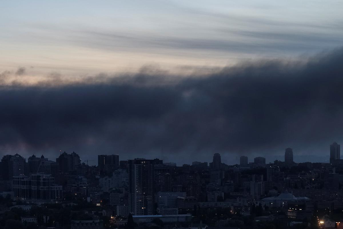 Smoke rises over the city during a Russian missile and drone strike, amid Russia's attack on Ukraine, in Kyiv, Ukraine May 14, 2026. REUTERS/Gleb Garanich