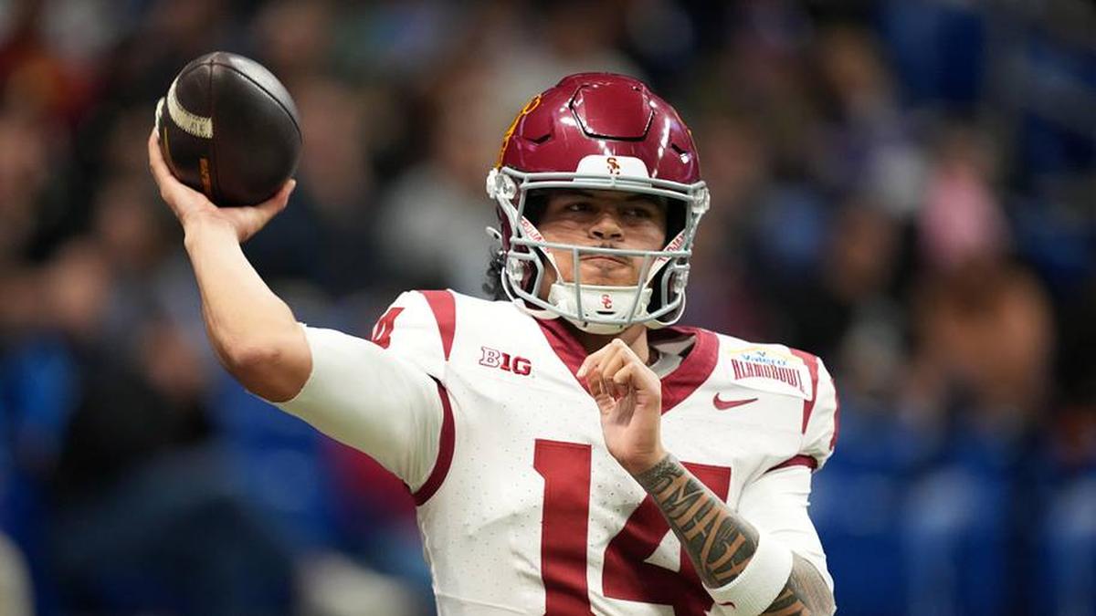  Dec 30, 2025; San Antonio, TX, USA; Southern California Trojans quarterback Jayden Maiava (14) throws the ball against the TCU Horned Frogs in the first half during the Alamo Bowl at Alamodome. Mandatory Credit: Kirby Lee-Imagn Images | Kirby Lee-Imagn Images 