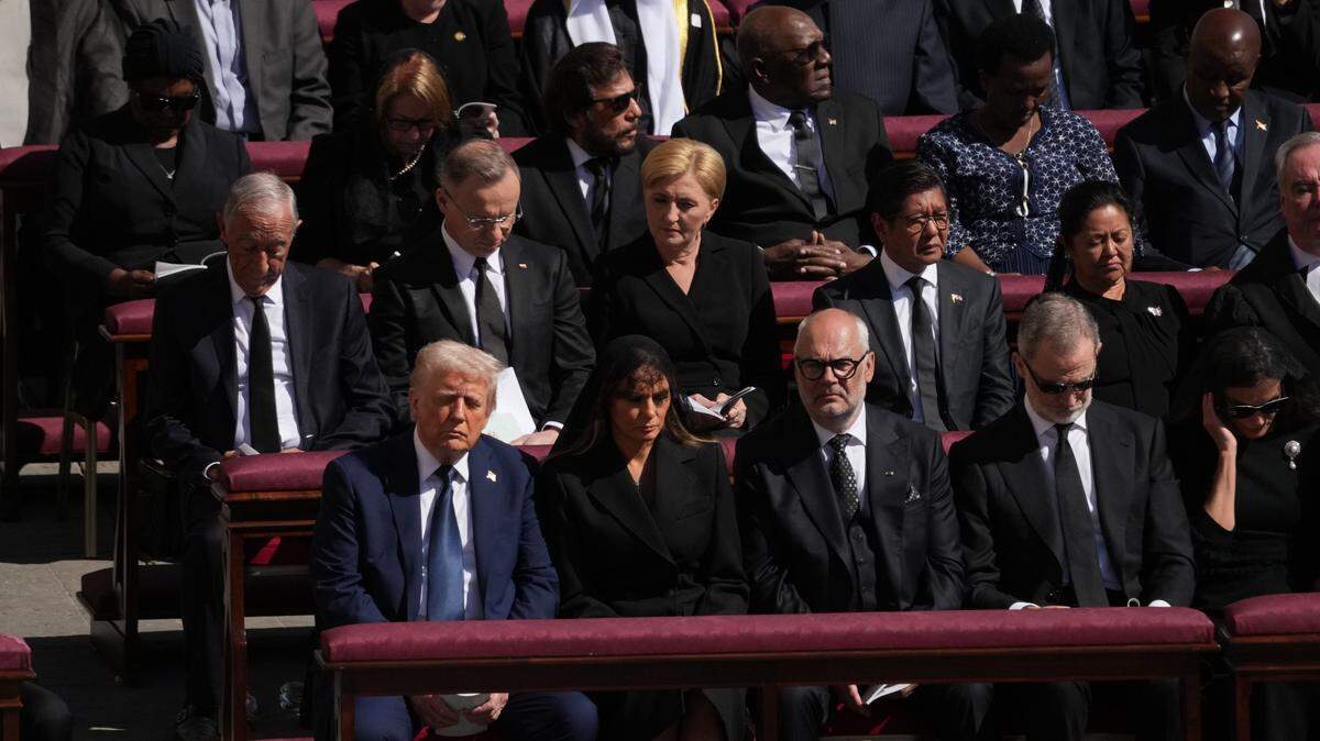 U.S. President Donald Trump and first lady Melania Trump attend the funeral of Pope Francis at St. Peter’s Square in Vatican City on Saturday, April 26, 2025. Also in the front row, from left: President Alar Karis of Estonia, King Felipe VI of Spain.