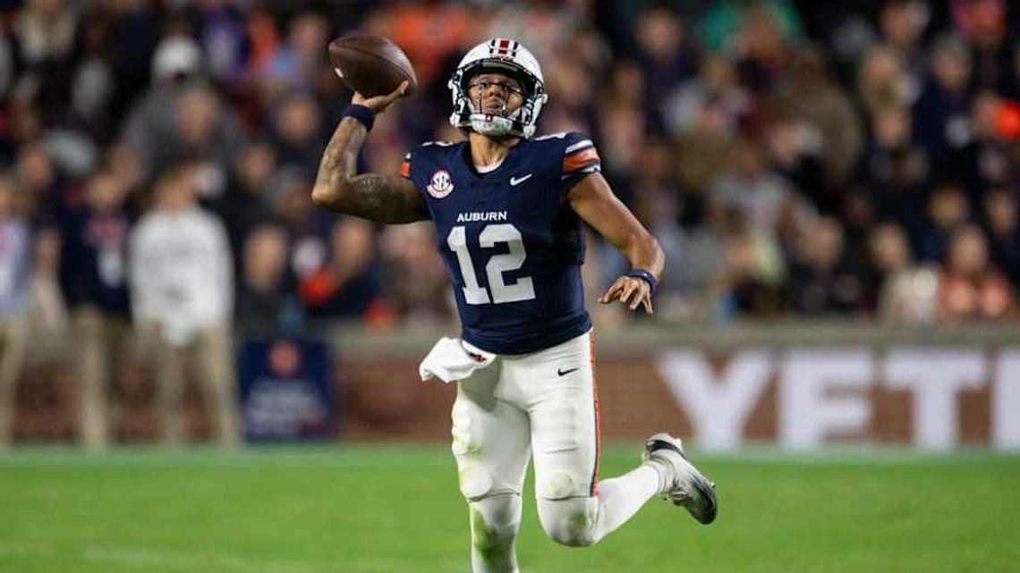  Auburn Tigers quarterback Ashton Daniels (12) pump fakes a pass as Auburn Tigers take on Kentucky Wildcats at Jordan-Hare Stadium in Auburn, Ala. on Saturday, Nov. 1, 2025. Auburn Tigers and Kentucky Wildcats are tied 3-3 at halftime. | Jake Crandall/ Advertiser / USA TODAY NETWORK via Imagn Images 