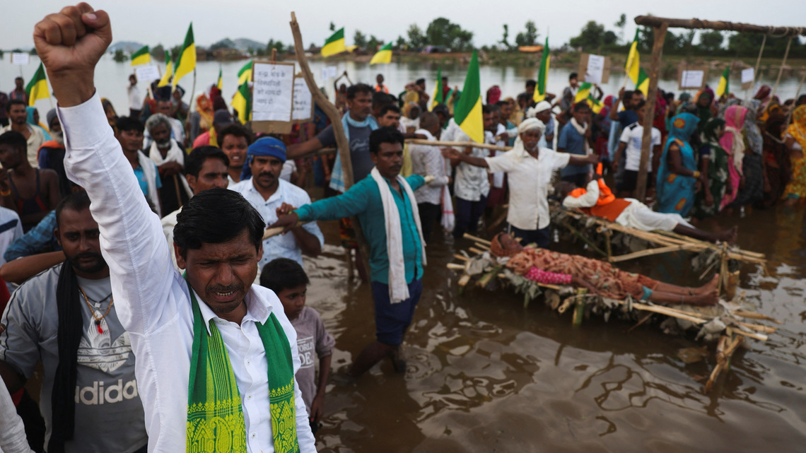 As rising waters flood homes and temples, villagers protest India's $87 billion river-linking project 